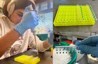 Laboratory technician disposing pipette tips into hazardous waste bin
