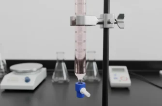 Close-up of a 50ml glass graduated burette with PTFE stopcock during titration